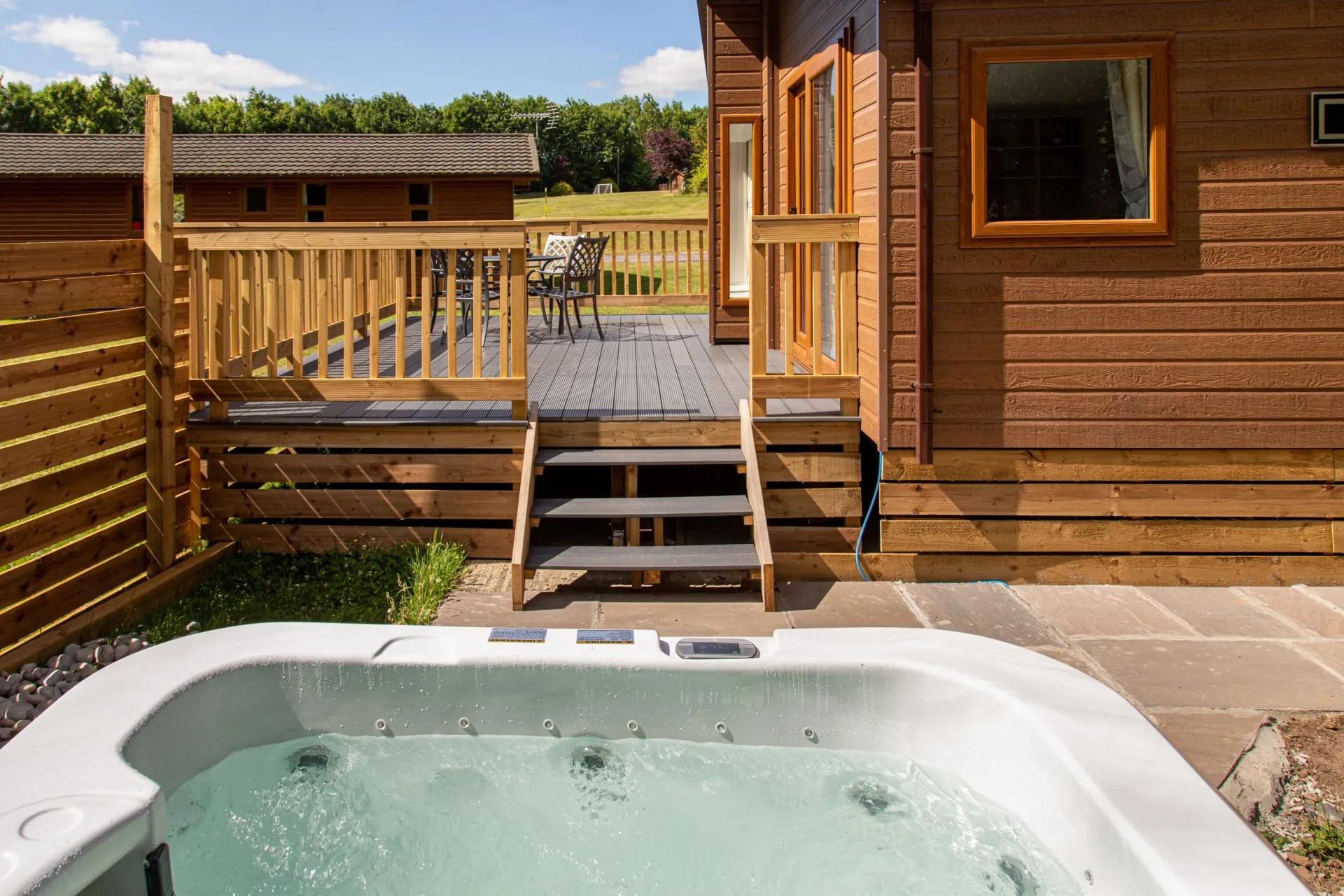 lodge with hot tub for sale